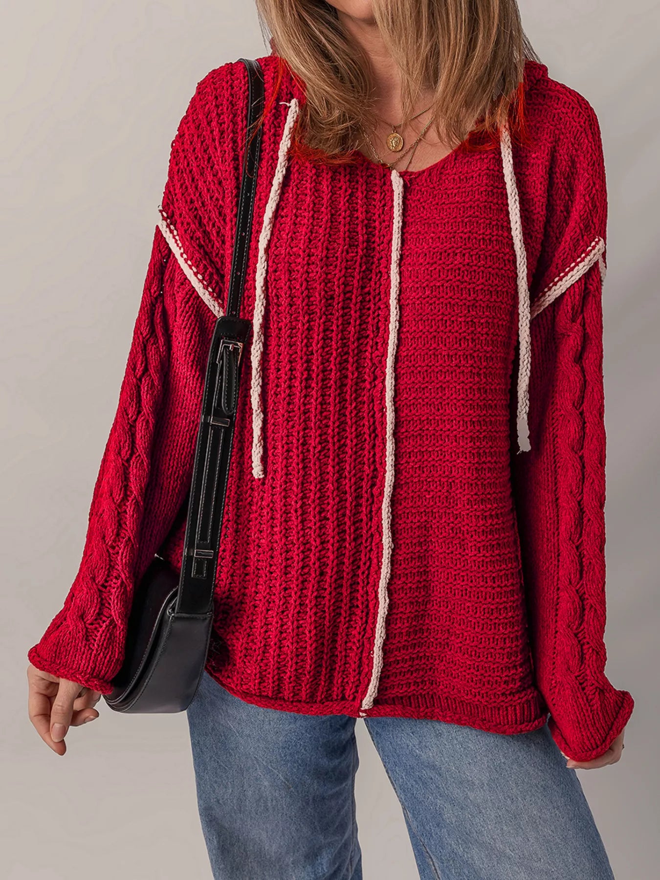 Deep red hooded sweater with contrast white trim, textured knit, ribbed cuffs