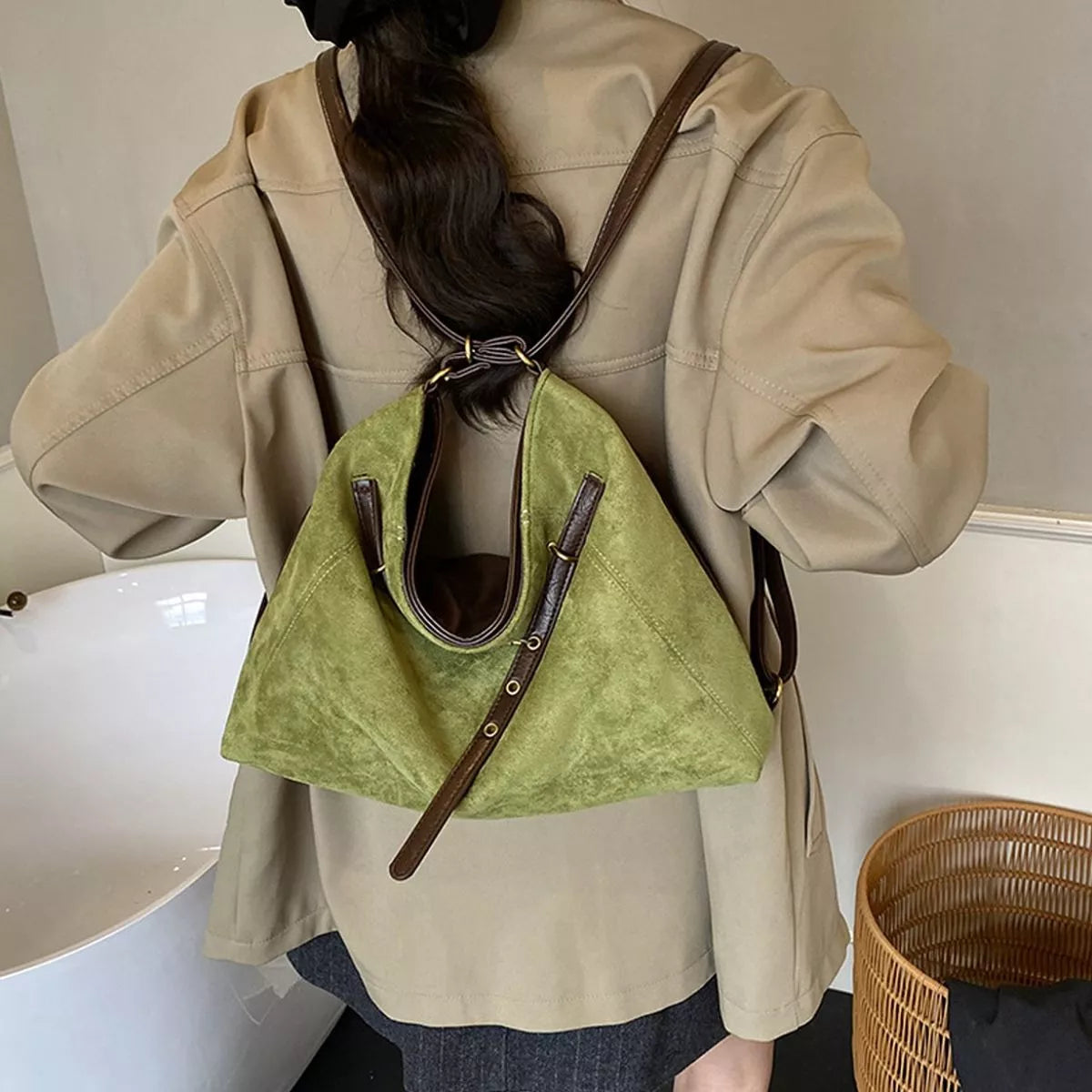 Medium green suede shoulder bag with brown contrast straps and top ring hardware