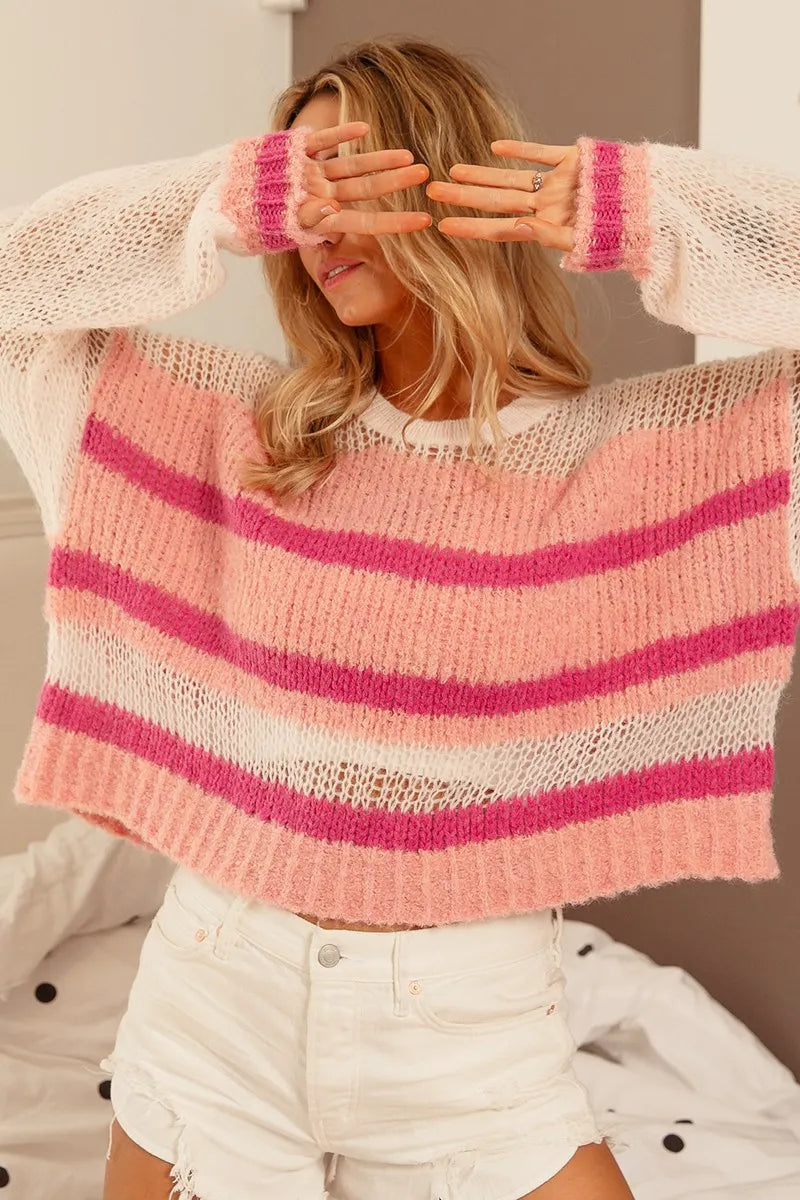 Striped cropped sweater with open-knit sleeves and hollow-out yoke; ivory and pink bands