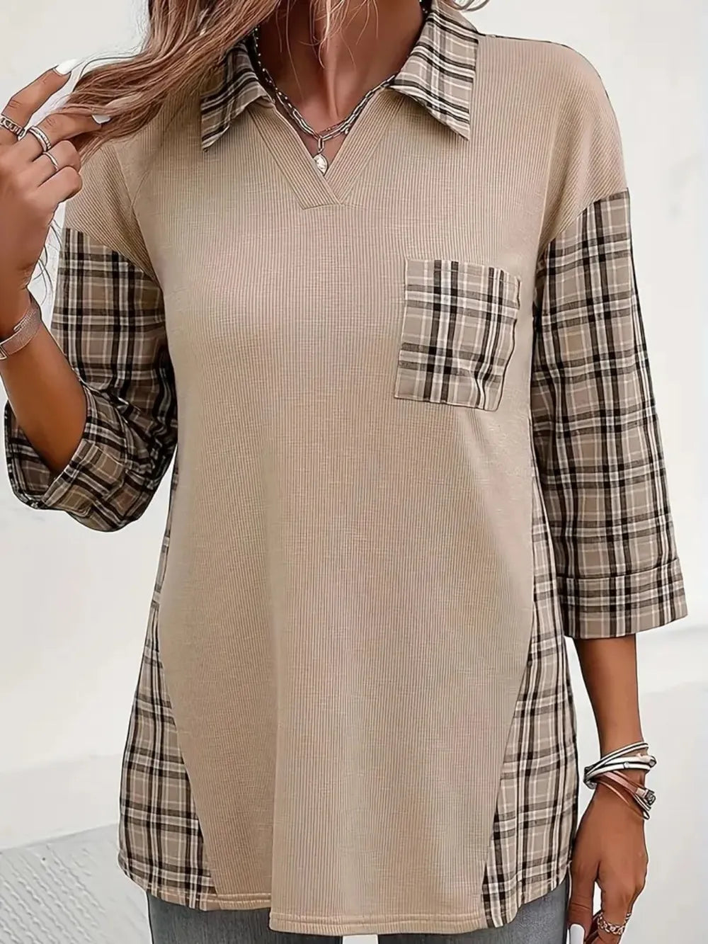 Beige three-quarter sleeve T-shirt with plaid Johnny collar, plaid sleeves, and chest pocket