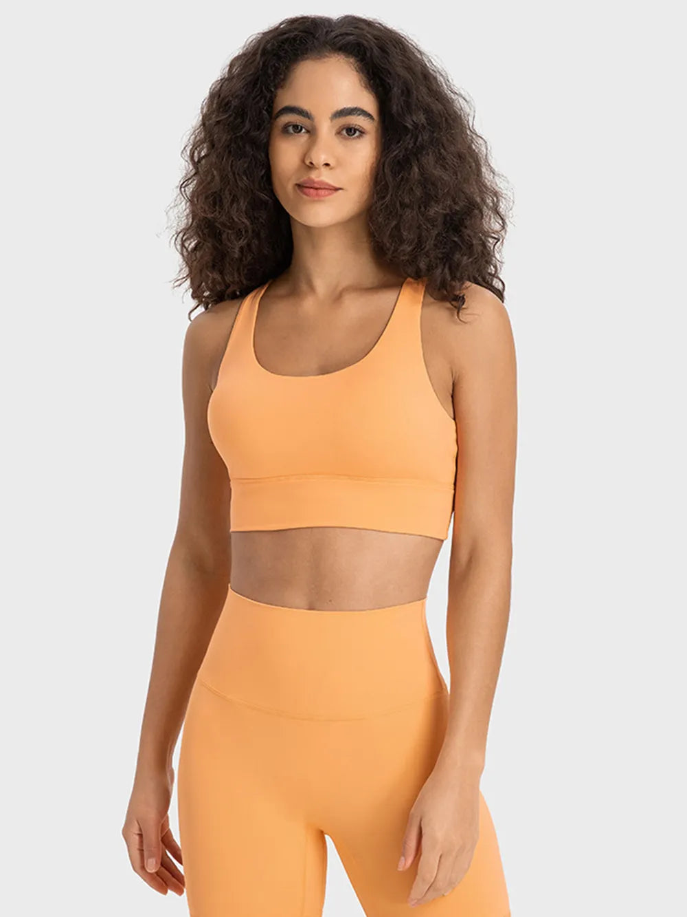 Orange active tank with scoop neck and wide underband