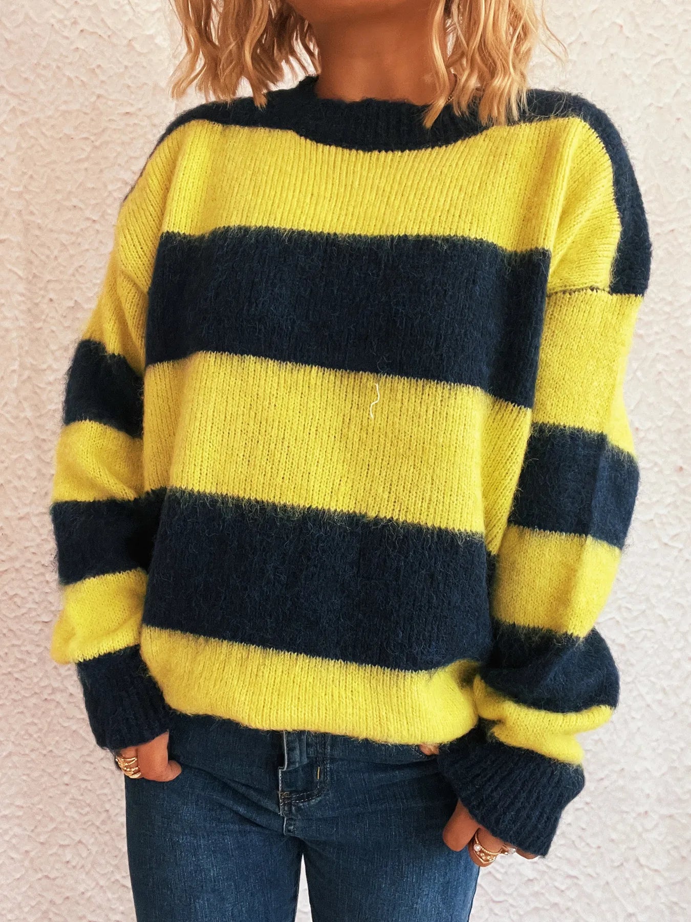 Yellow and navy horizontal stripe long-sleeve sweater with crew neck, ribbed hem