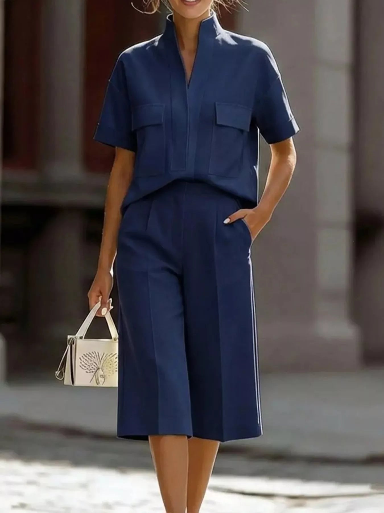Dark blue short-sleeve button-front top and wide-leg pants set, chest pocket