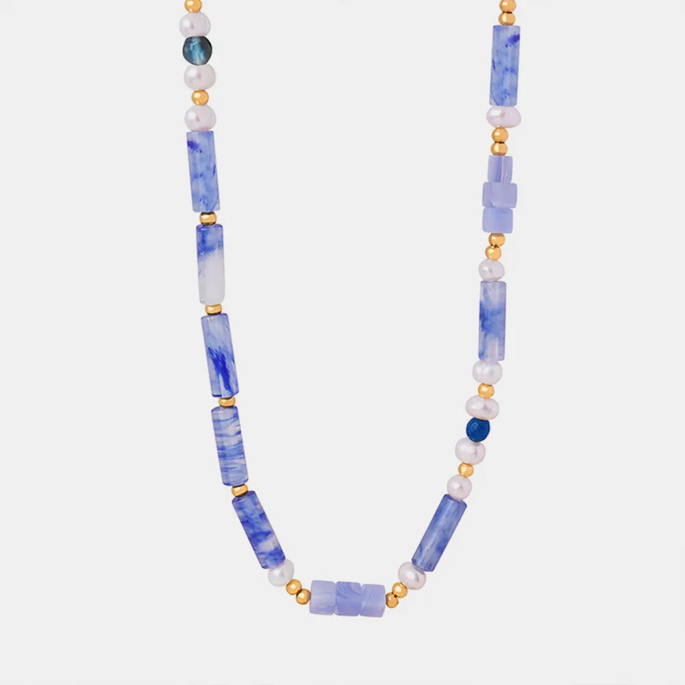 Blue and white bead necklace with rectangular blue beads and freshwater pearls