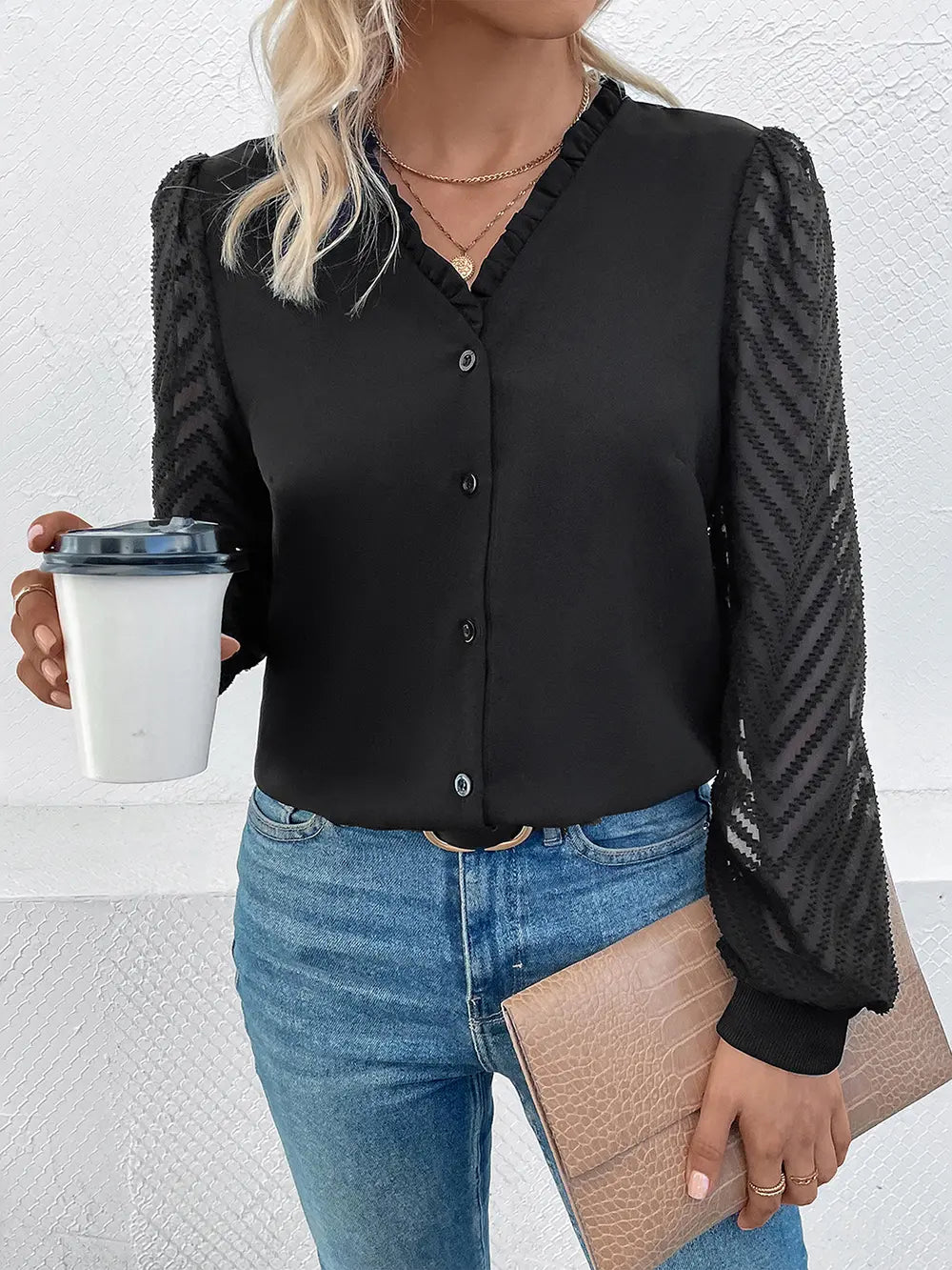 Black V-neck button-front mesh blouse with sheer sleeves and long cuffed ends