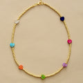 Gold-tone beaded heart-stone necklace with blue, pink, green, and orange hearts