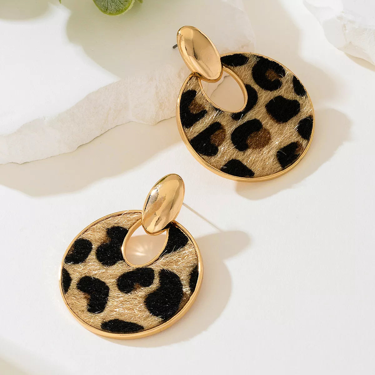 Leopard print round dangle earrings with gold-tone oval top hoops