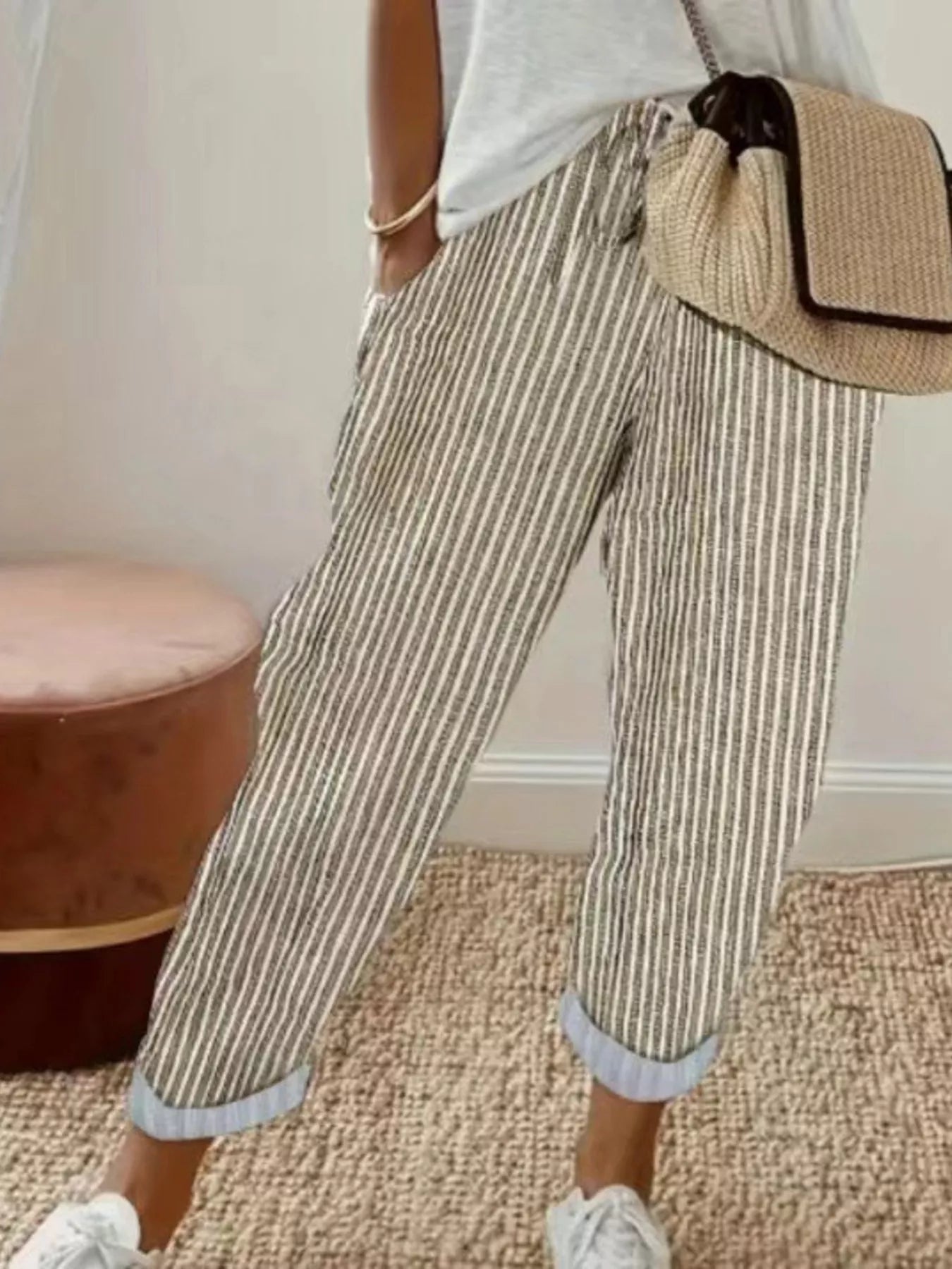 Striped cropped pants with drawstring pockets, beige and white vertical stripes