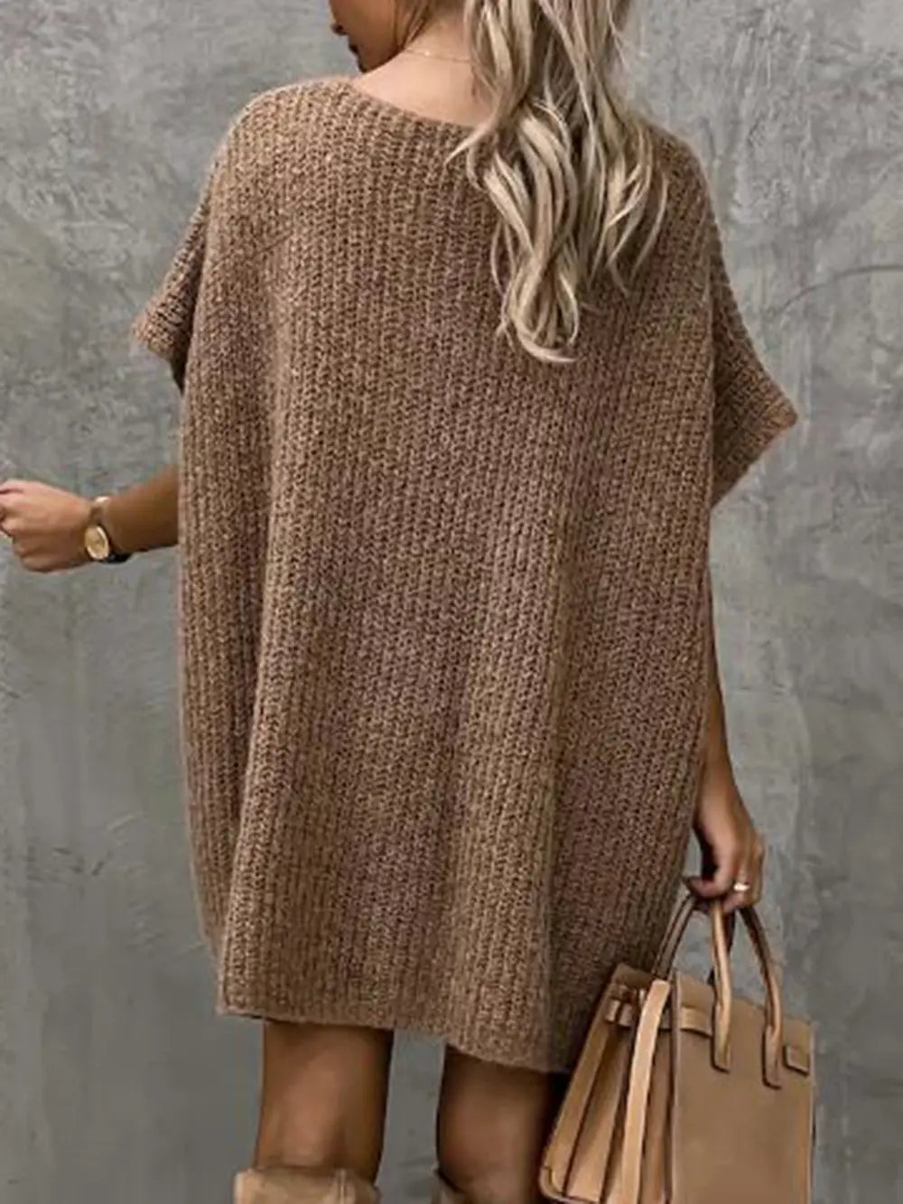 Taupe short-sleeve knit sweater, relaxed tunic fit with V-neck detail.