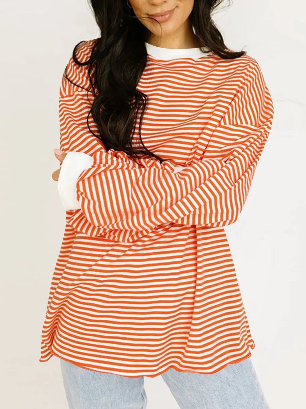 Contrast striped long-sleeve sweatshirt, orange contrast trim and orange-and-cream horizontal stripes
