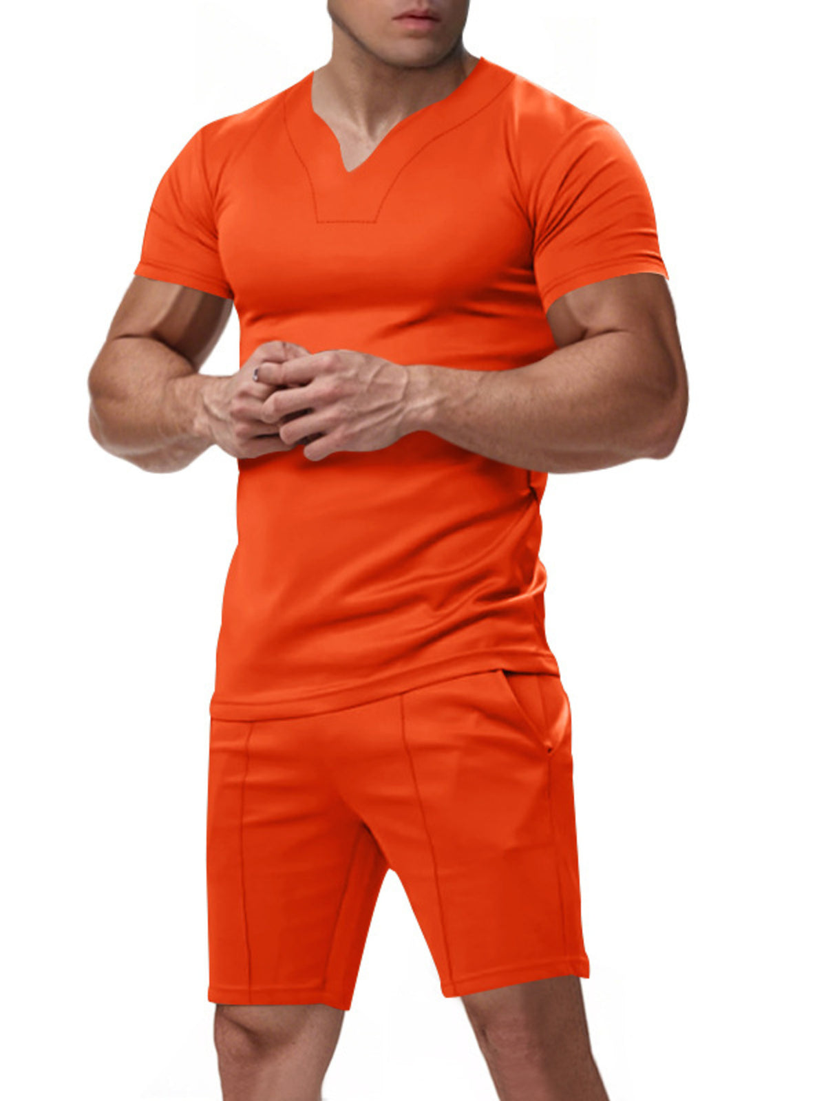 Men's orange V-neck stretch tee and matching shorts set, relaxed fit, pull-on waist.