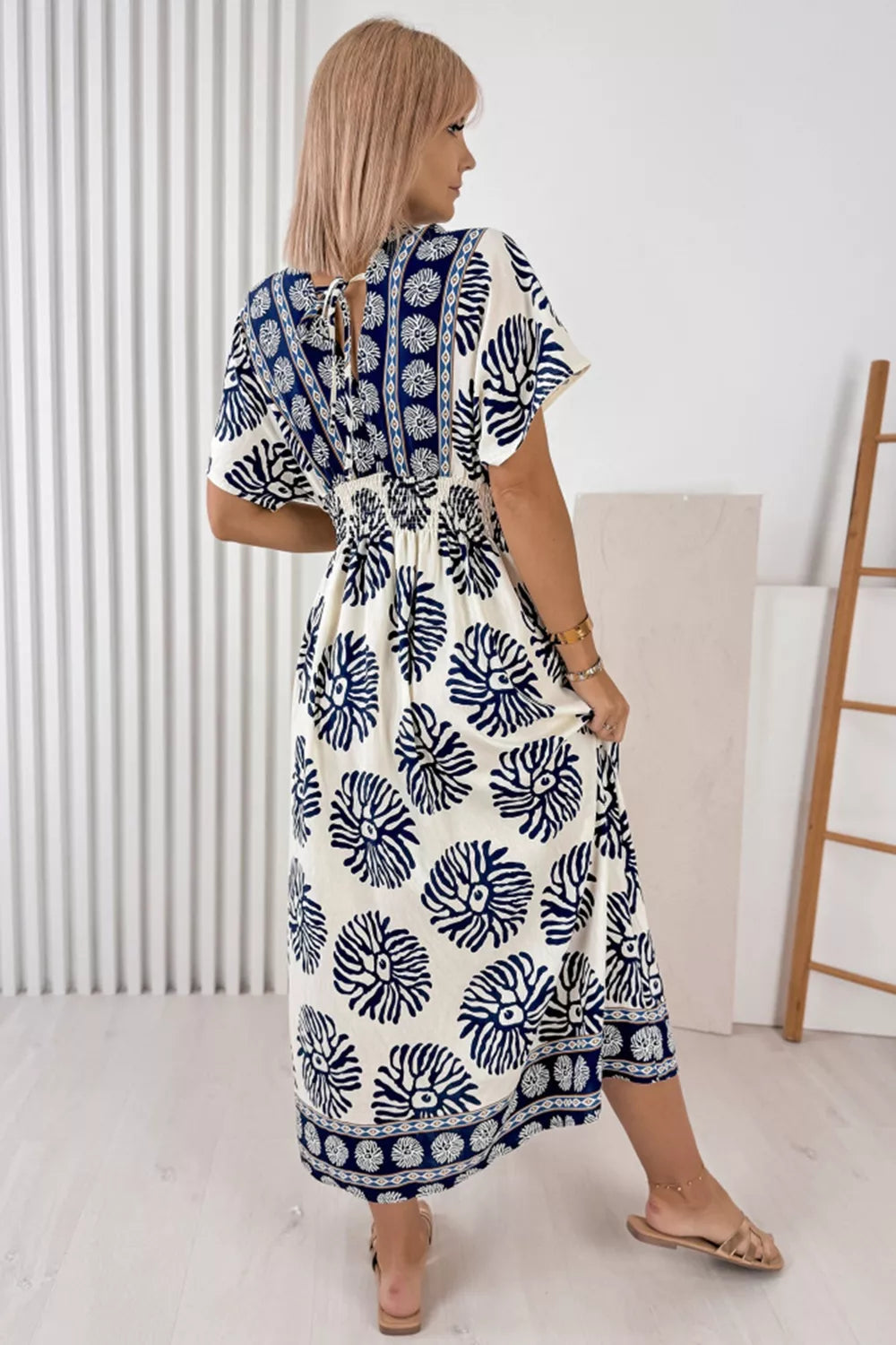 Floral print V-neck dolman dress with contrast yoke and border hem, blue-and-white