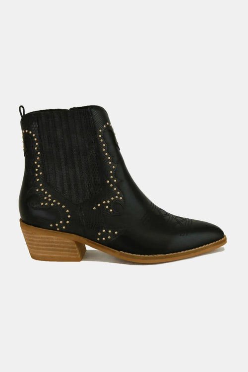 Black point-toe ankle boots with studded V-pattern sides and low block heel