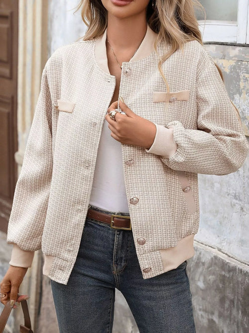 Light khaki textured button-up long sleeve jacket with chest flap pockets and gold buttons