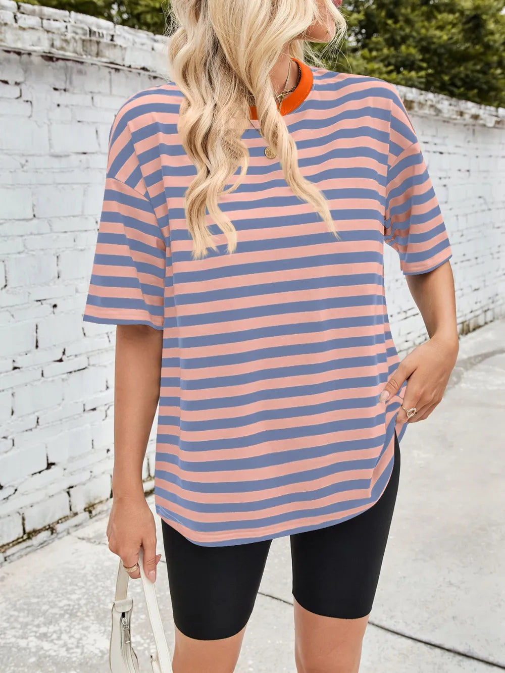 Peach striped round-neck half-sleeve T-shirt, slightly longer length, front view.