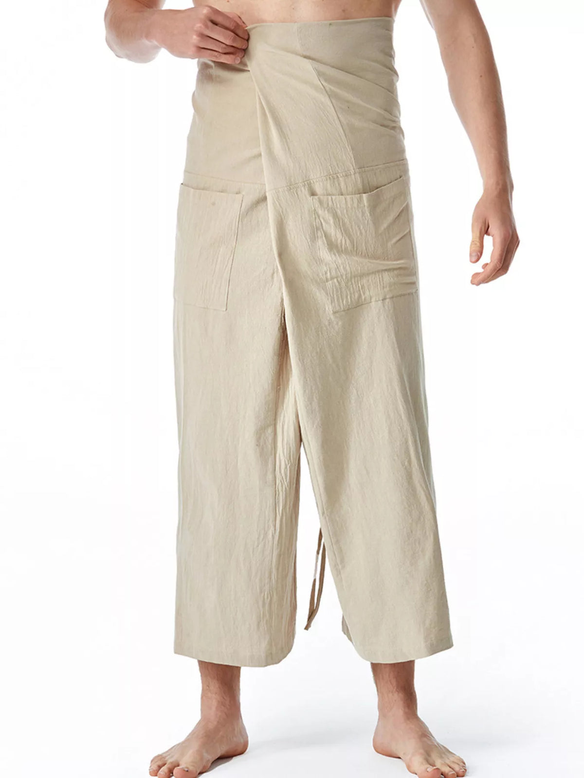 Men's loose-fit drawstring pants in light cream, loose cropped legs and elastic waist tie.