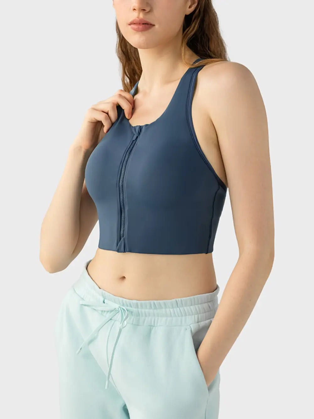 Dark blue sport bra with full-length front zipper and wide straps