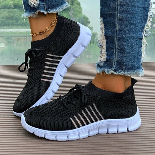 Black breathable mesh athletic shoes, round toe, lace-up, striped sides, white sole.