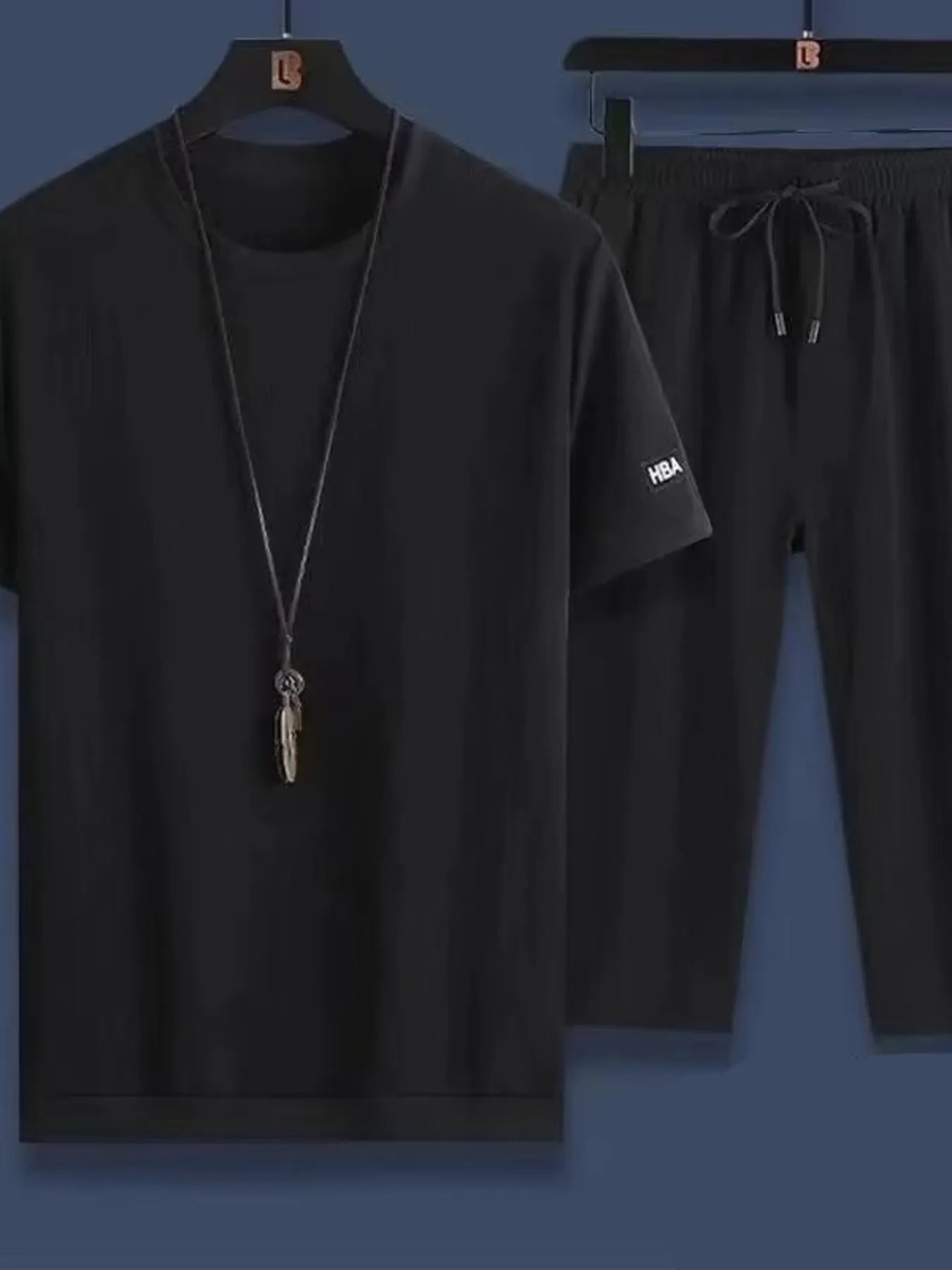 Black round-neck short-sleeve top and drawstring shorts set for men