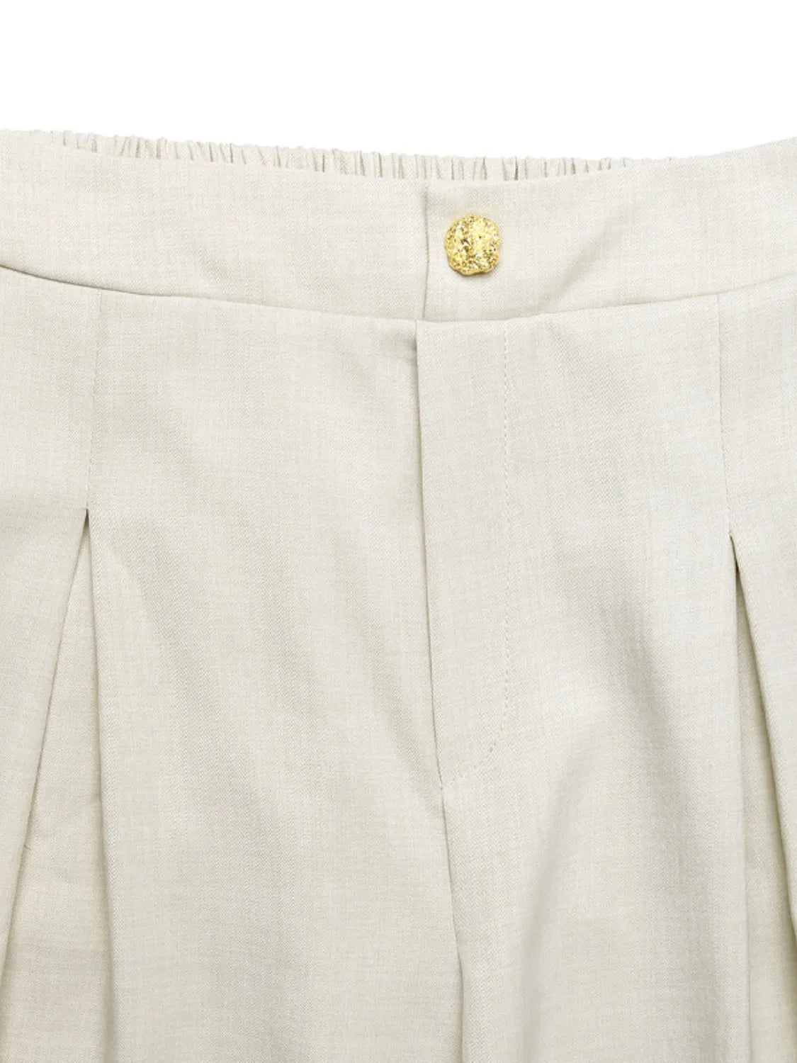 Beige pleated pants waistband with elastic back and round button