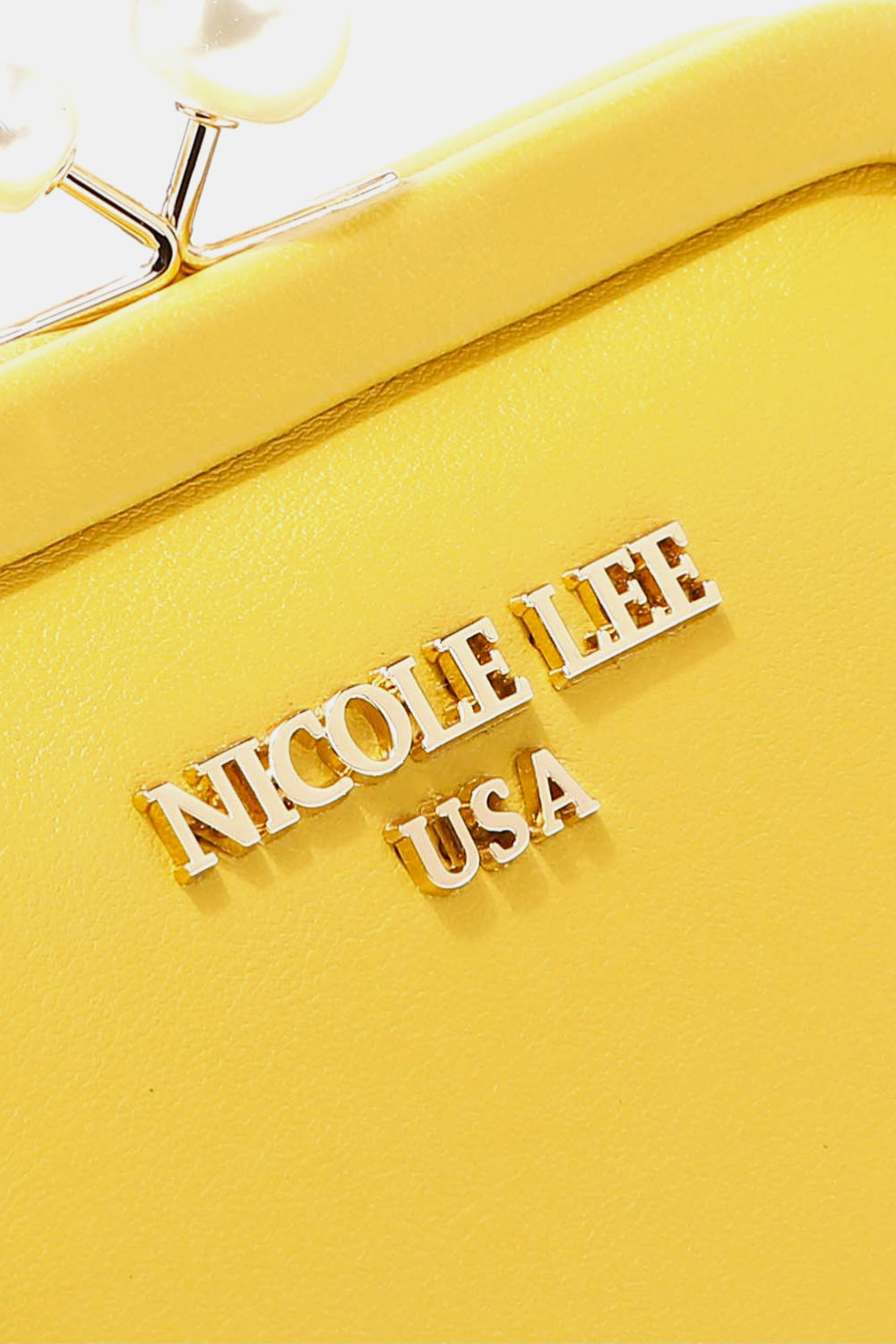 Nicole Lee USA Elise pearl coin purse, yellow with embossed logo on front panel.