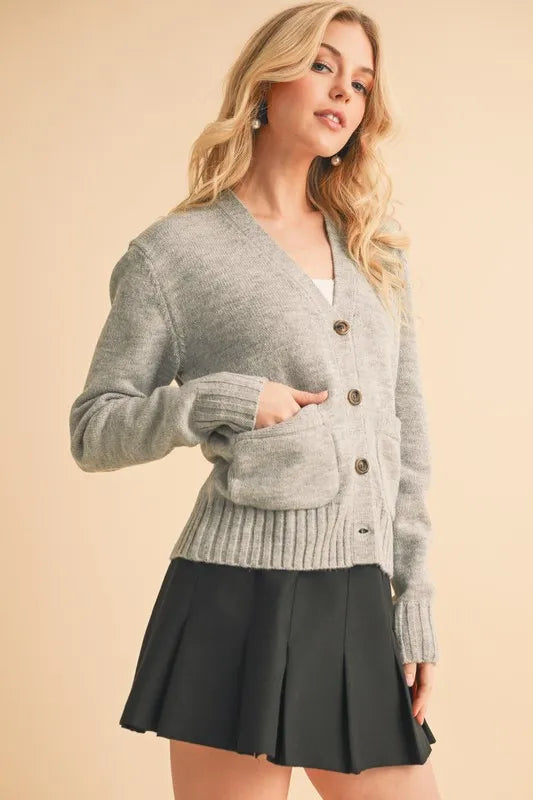 Gray knit V-neck button cardigan with button front and front patch pocket