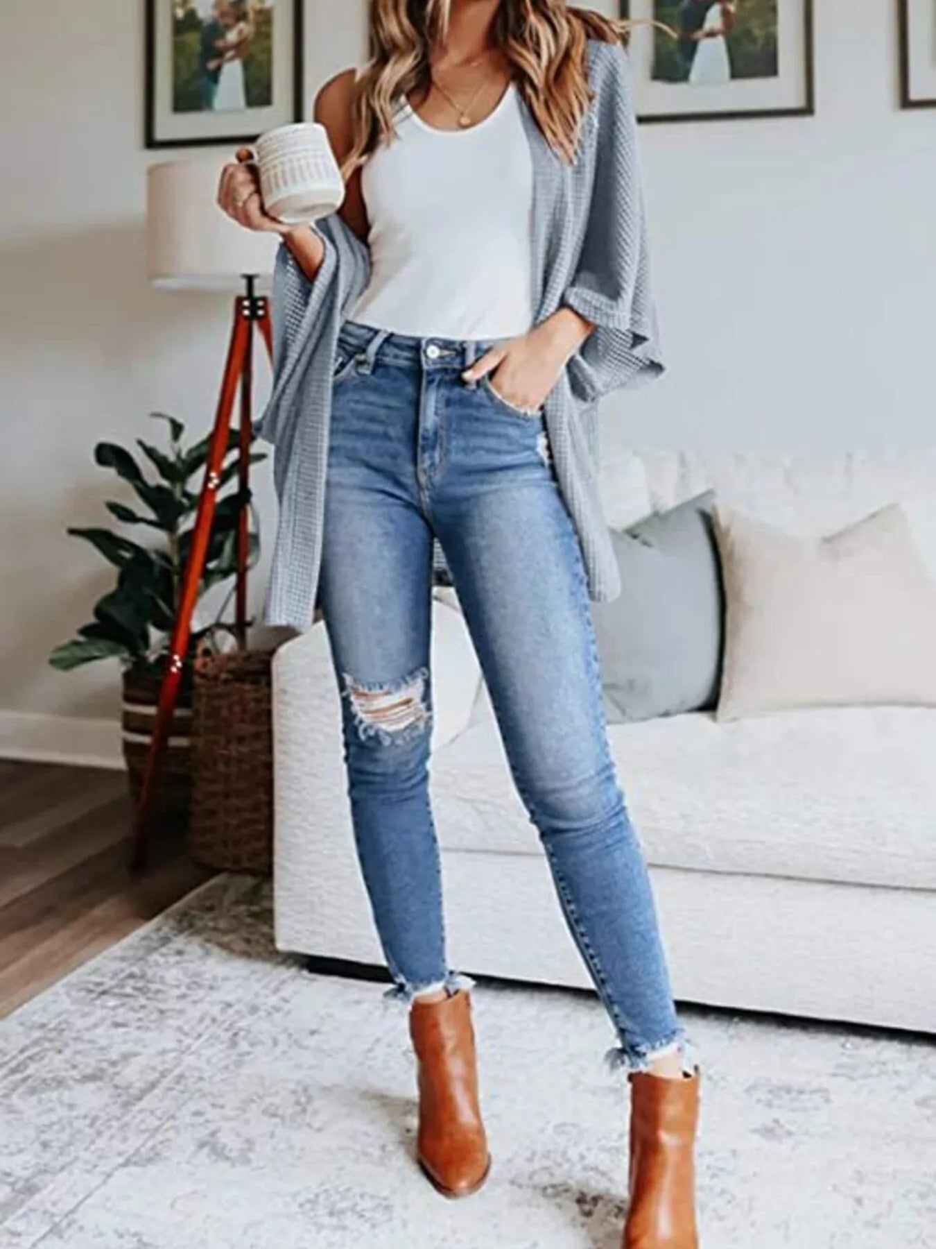 Waffle knit open-front cardigan over a white tank and blue jeans, light blue grey