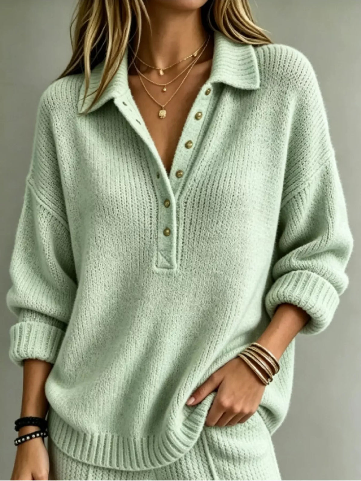 Mint green button-front dropped-shoulder knit sweater with ribbed collar and cuffs