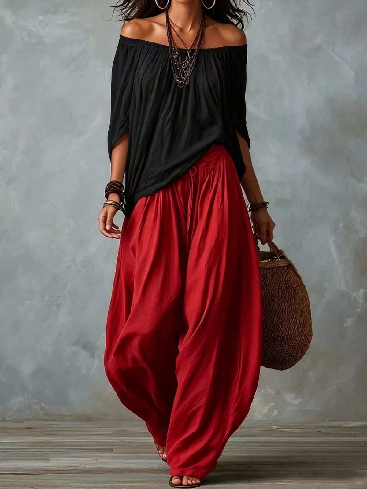 Off-shoulder harem pants set with black off-shoulder top and red balloon pants