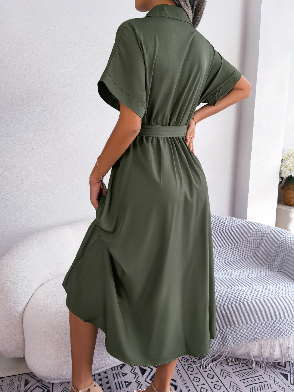 Army green short-sleeve collared tie belt dress from back, cinched waist and flare