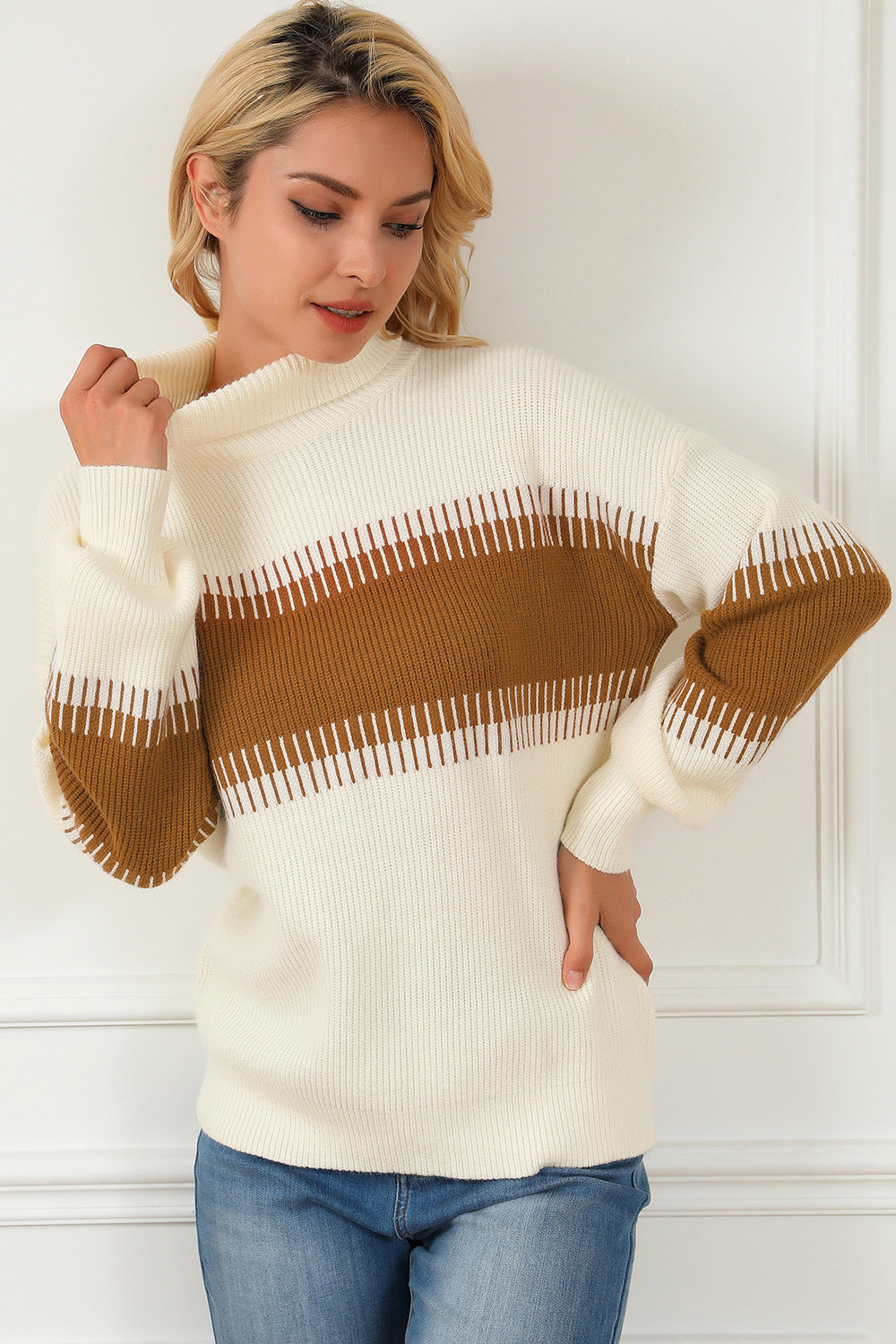 Cream knit turtleneck sweater with brown stripe across chest and sleeves
