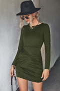 Army green twist front ruched long sleeve mini dress, front view with ruched twist