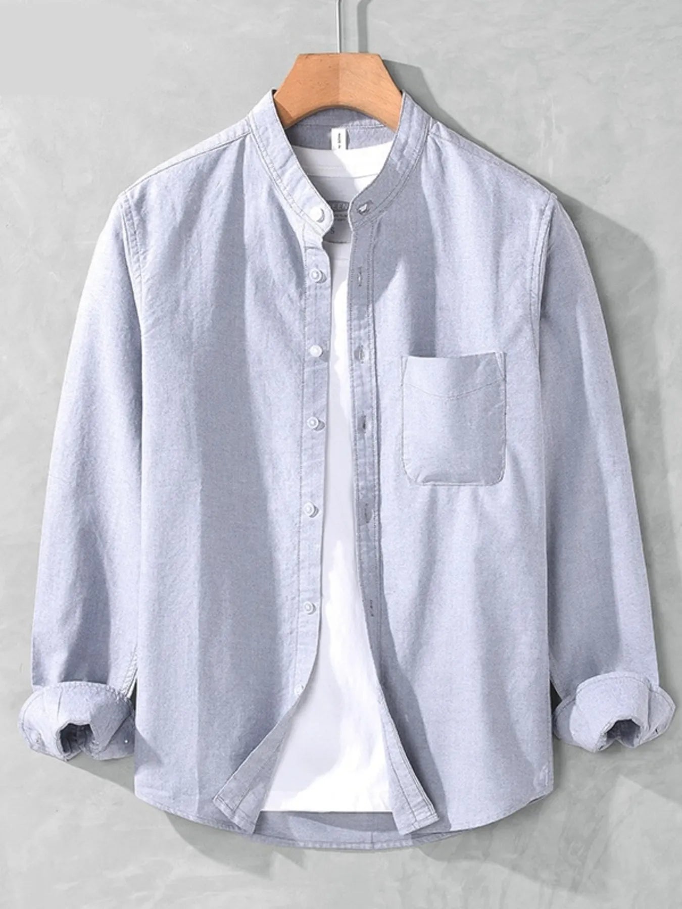 Light blue men's plus-size button-up long-sleeve shirt with chest pocket, front view