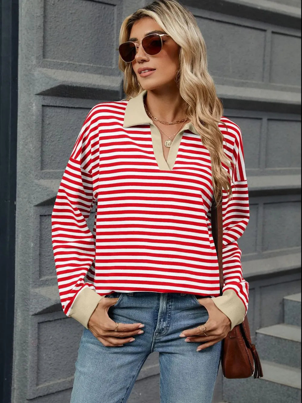 Red-and-white striped Johnny collar sweatshirt with long sleeves and ribbed cuffs