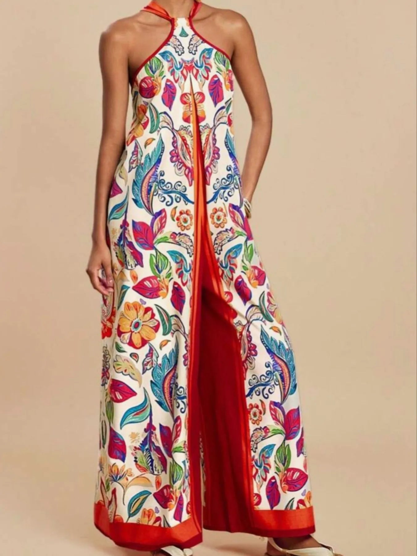 Red halter wide-leg jumpsuit with multicolor floral and bird print