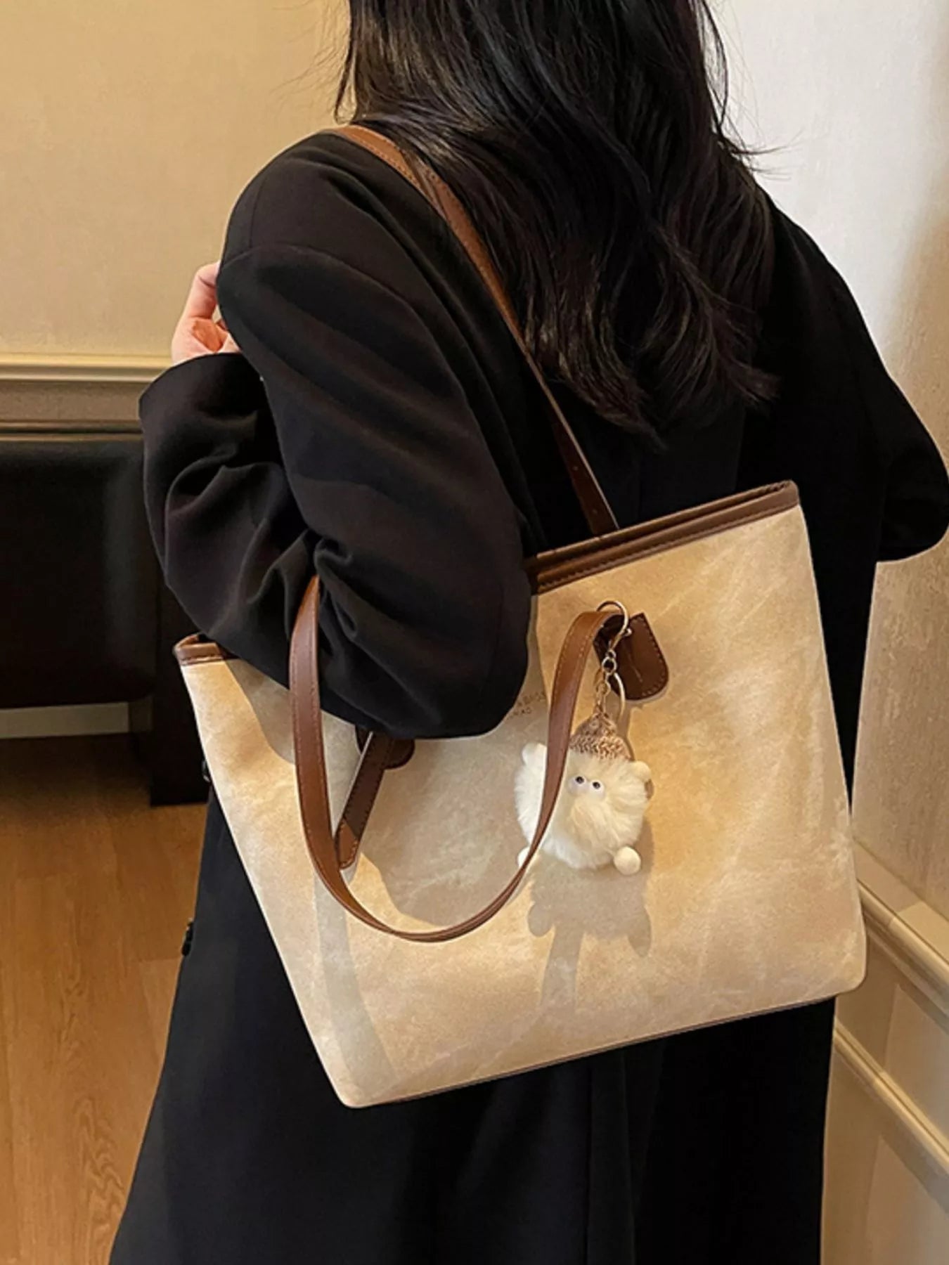 Medium beige PU shoulder bag with brown straps and a white plush charm