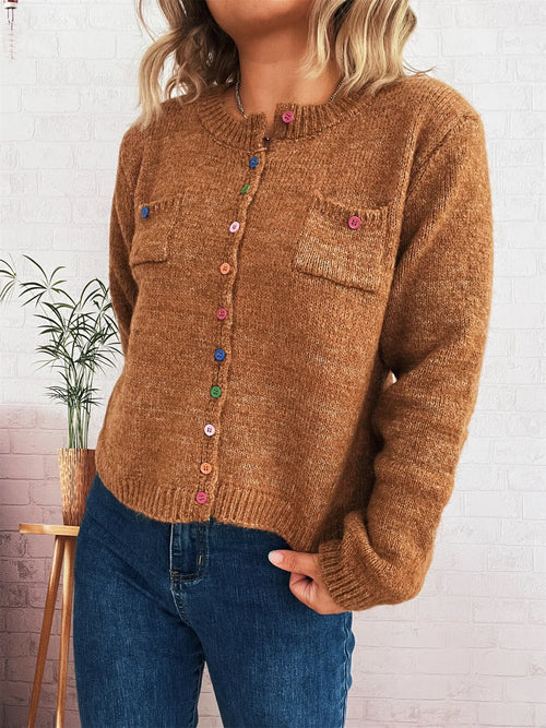 Brown knit button-up cardigan with chest pockets and multicolor button front