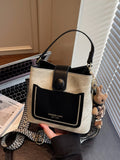 Two-Tone Bucket Crossbody Bag, small PU, beige body with black front pocket and rhinestone trim