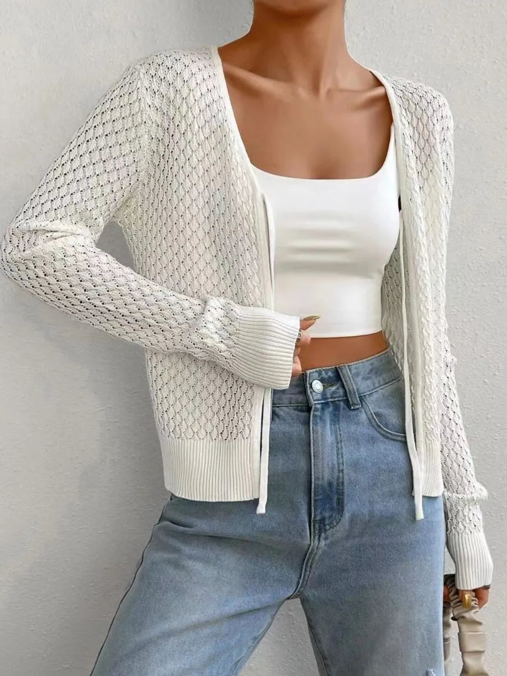 White openwork knit cardigan with open front and long sleeves