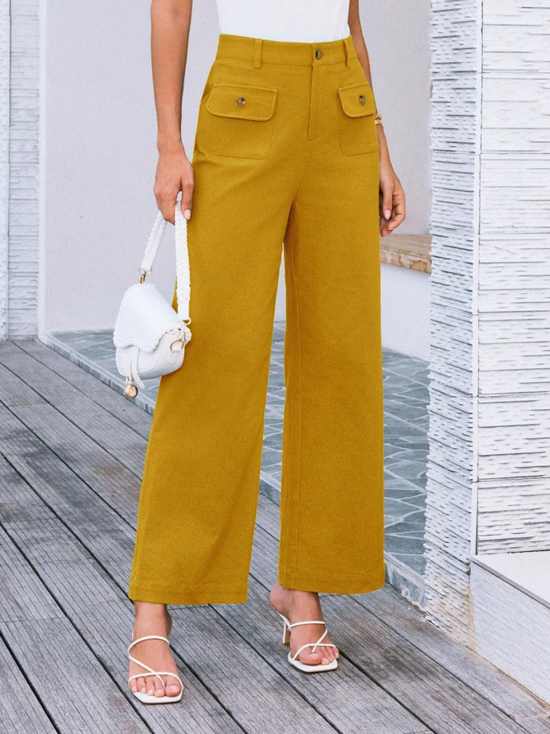 High waist wide leg pants in mustard yellow with front button and flap pockets