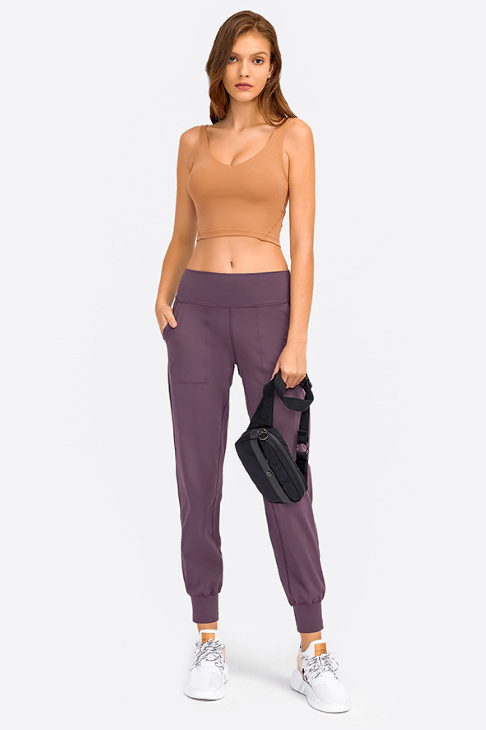 Tan deep V-neck crop sports bra with smooth cups