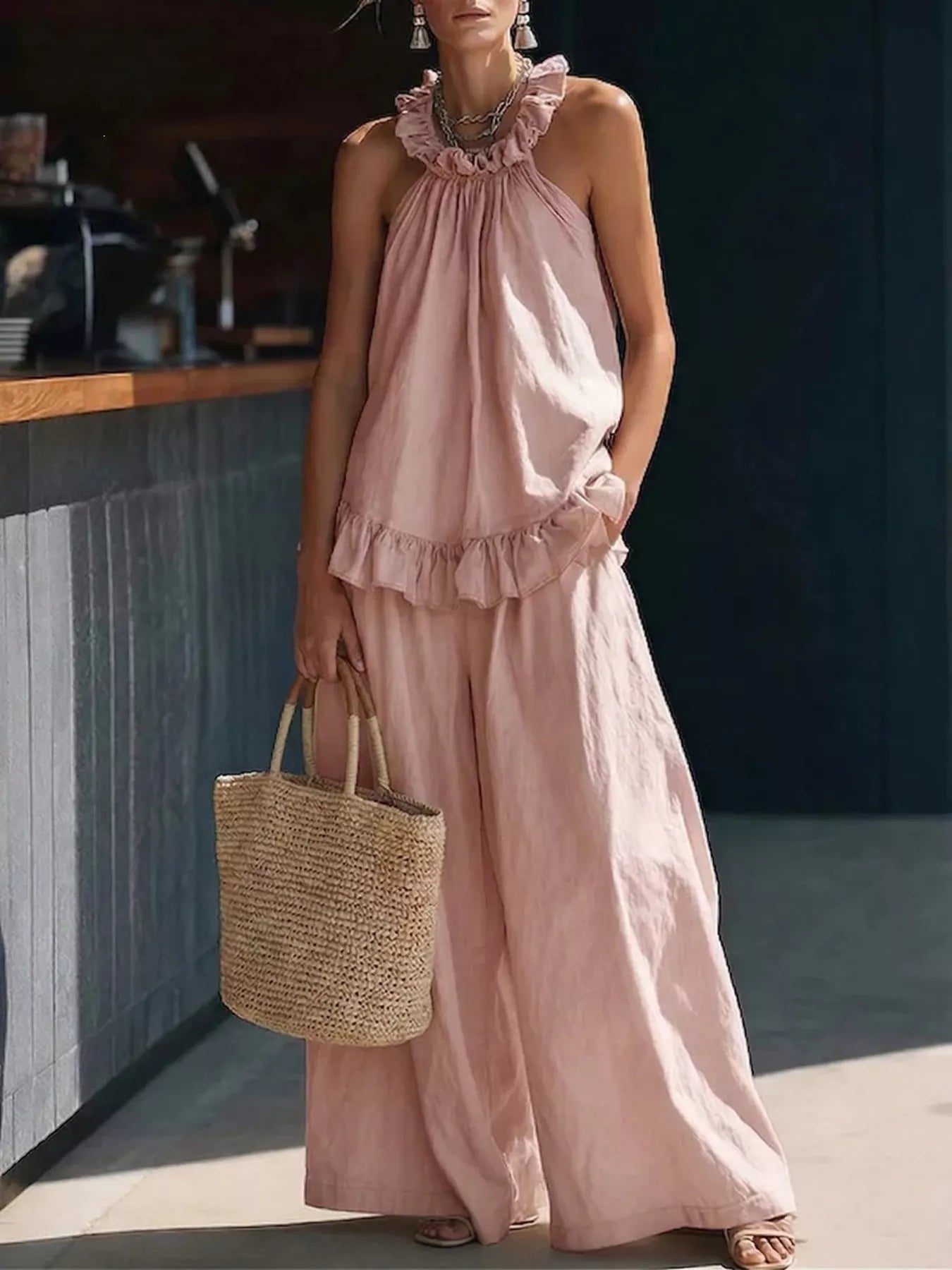 Pink ruffled halter neck top and wide-leg pants set, soft tiered ruffles
