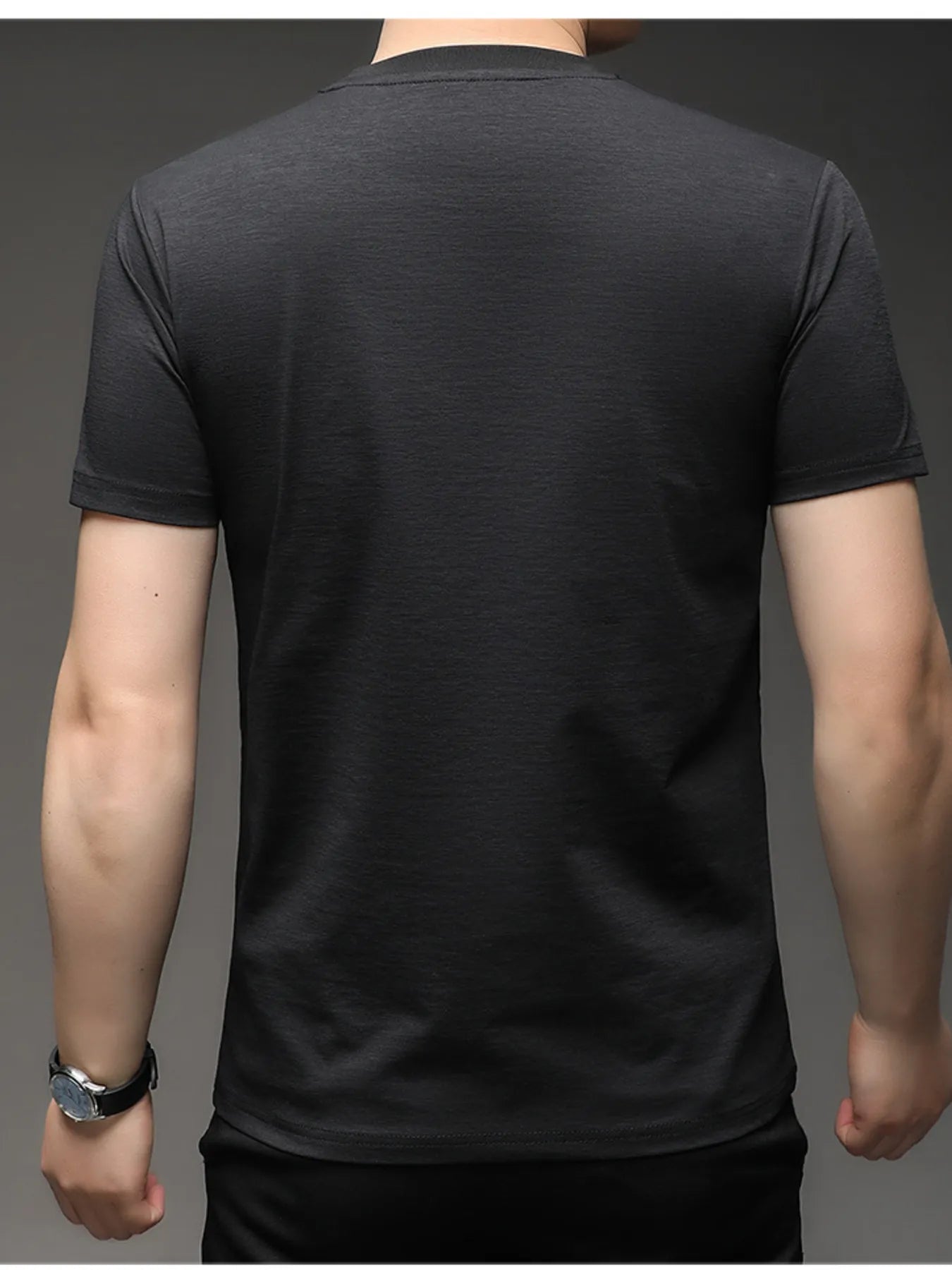 Men's plus size raglan crew-neck T-shirt in black, short sleeves, back view, contrast seaming