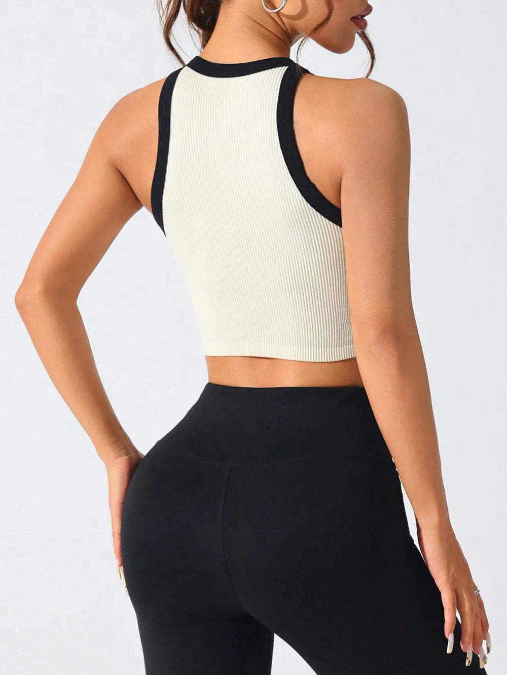 Cream contrast-trim racerback active tank with black binding and round neck