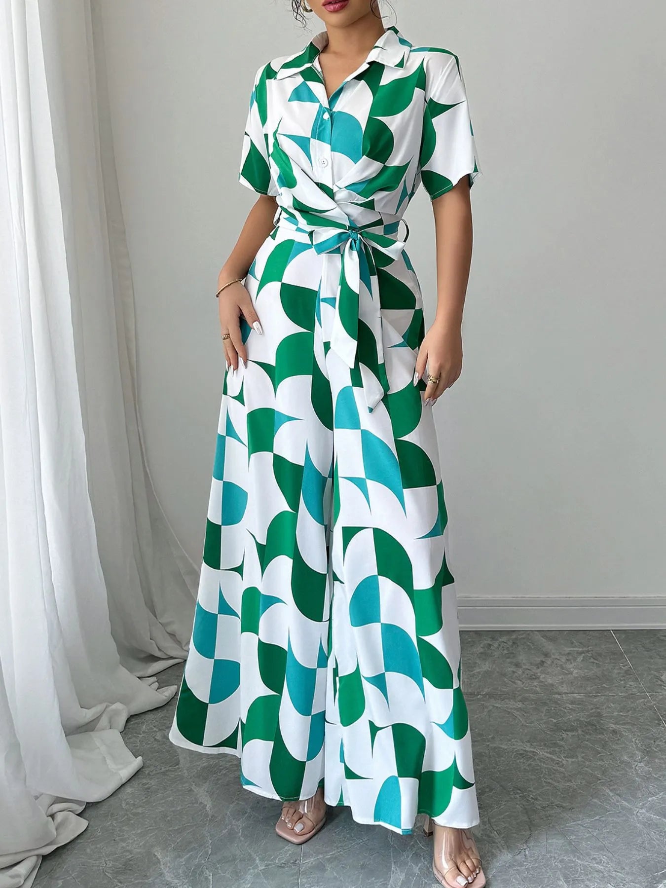 Green and turquoise geometric belted wide-leg jumpsuit, short sleeves, button front