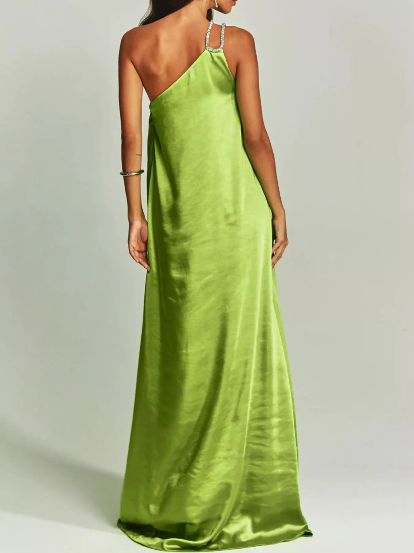 Cedar & Moore: One-Shoulder Rhinestone Satin Maxi Dress in lime green, back view with jeweled strap.