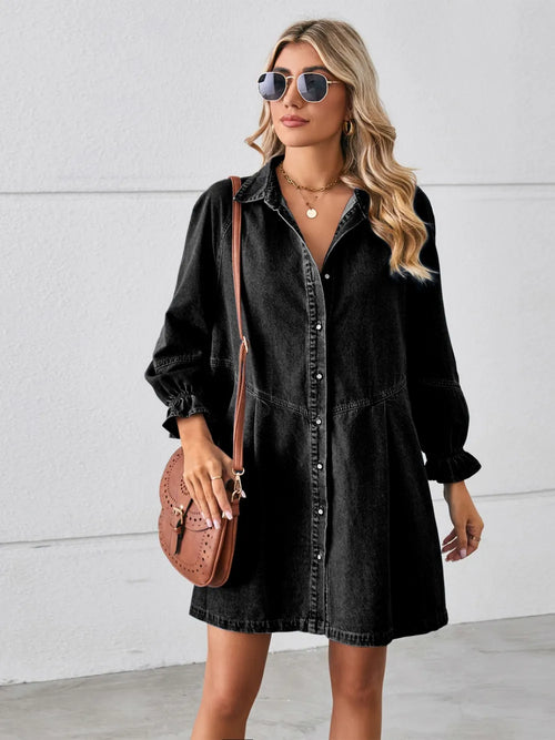 Black denim mini dress, button-front with puff sleeves and gathered flounce hem.