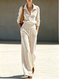 Cream half-zip sweatshirt and wide-leg lounge pants set, matching velour look
