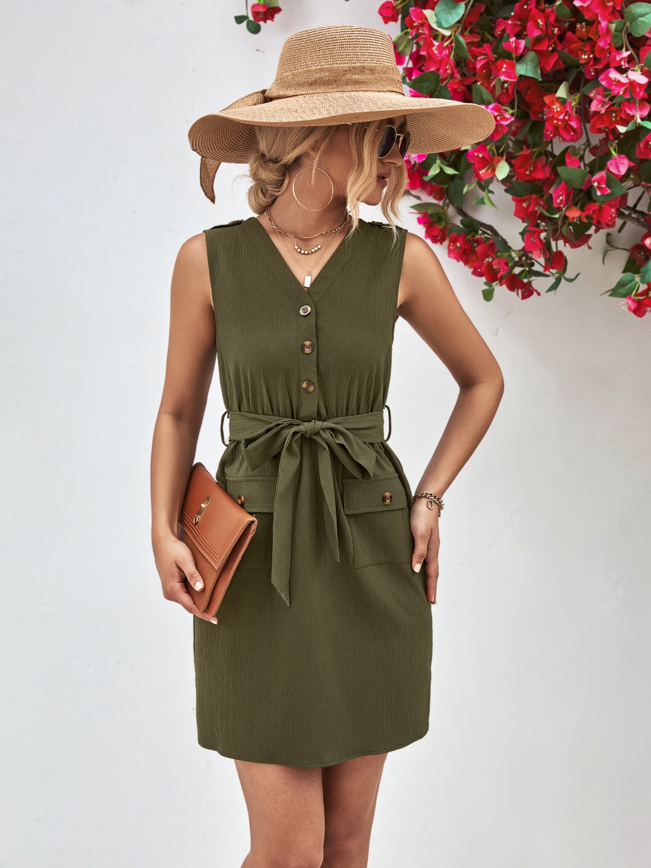 Army green sleeveless V-neck button dress with tied waist belt and pocket detailing