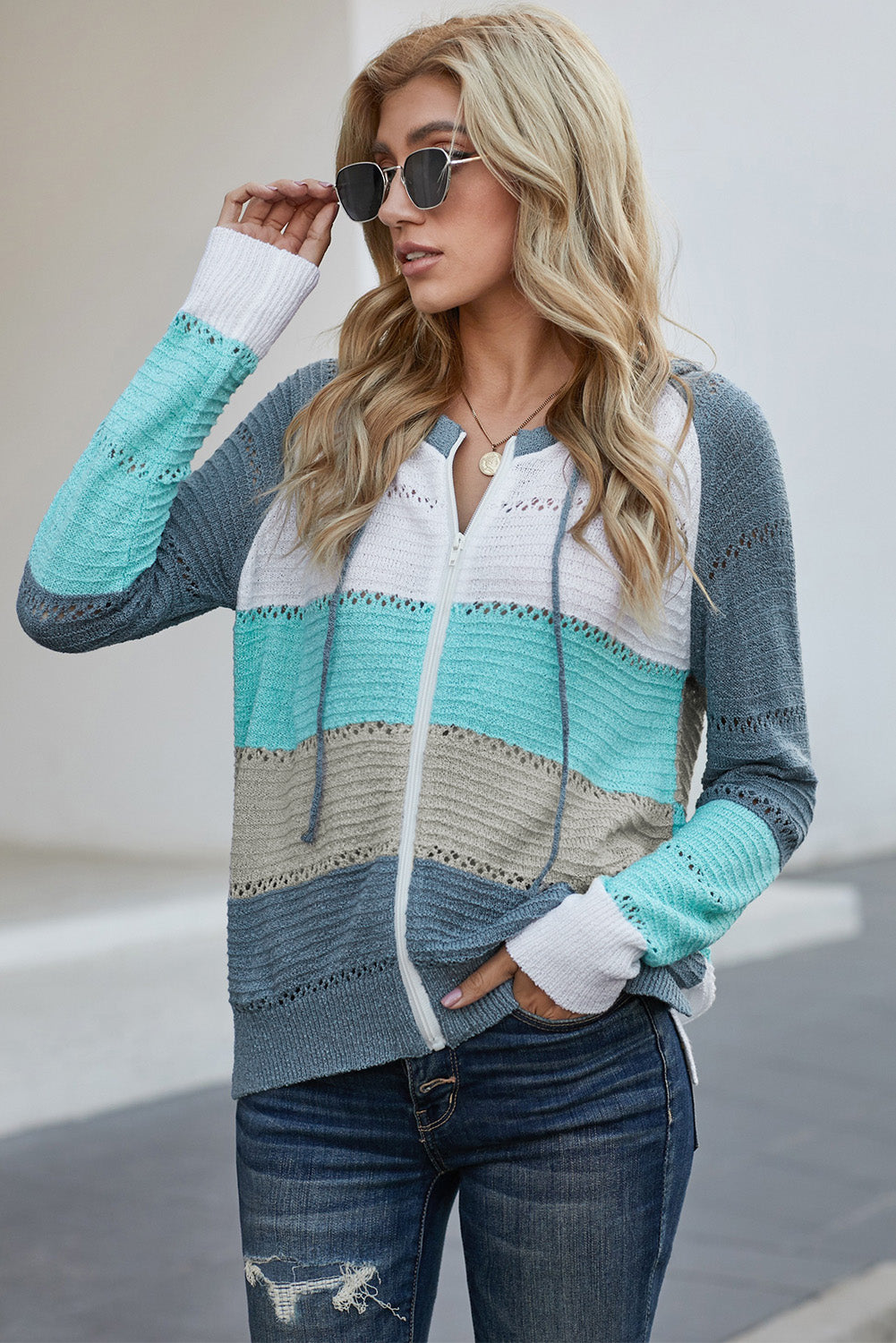 Zip-up hooded cardigan in blue, gray, and turquoise with striped openwork knit